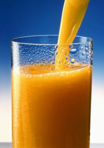 A glass of orange juice,able to immunize your body and support your skin lightening